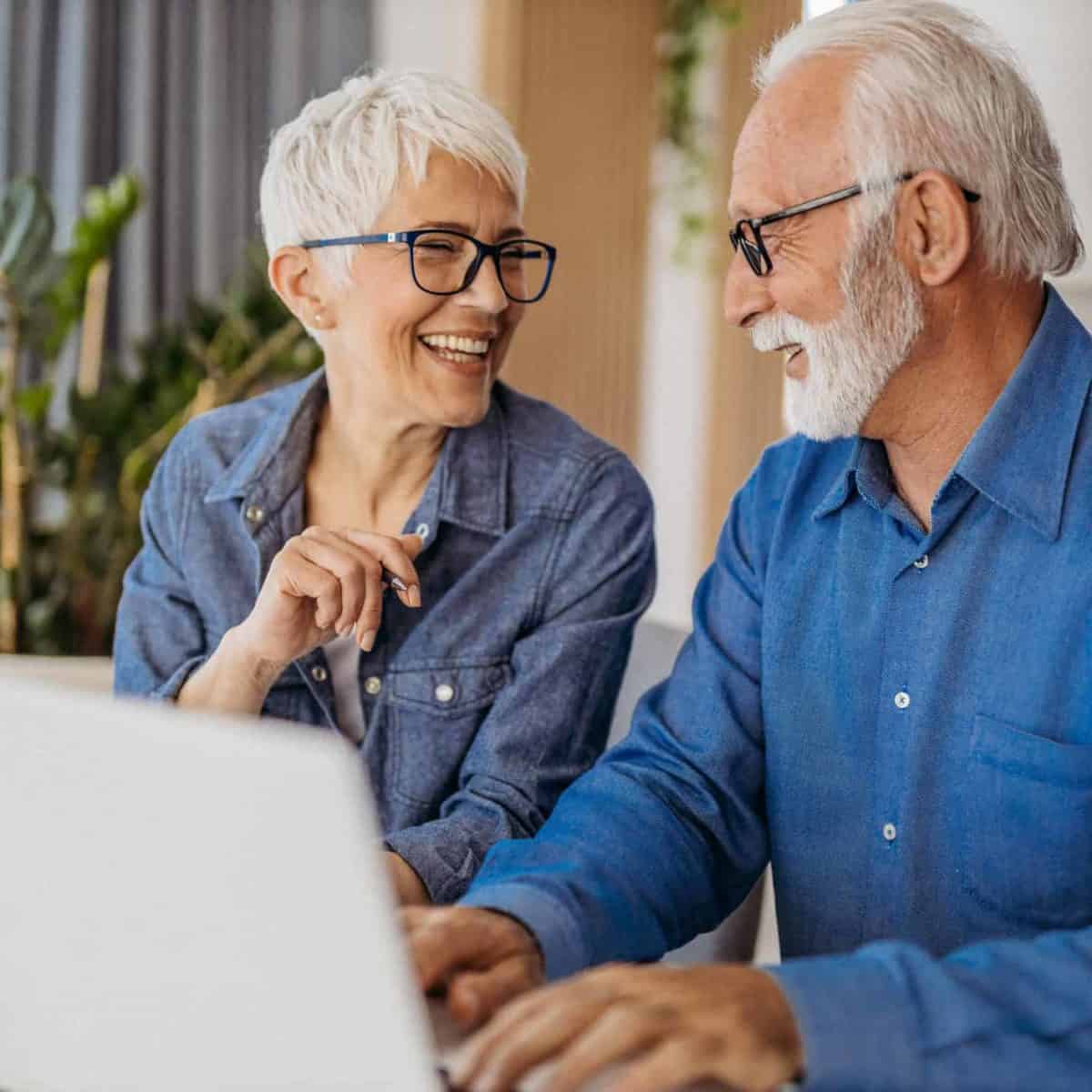 Pittsburgh Precious Metals IRA & Investing Company Copy of Senior couple at laptop smiling GettyImages 1323096524 1200x1200 1